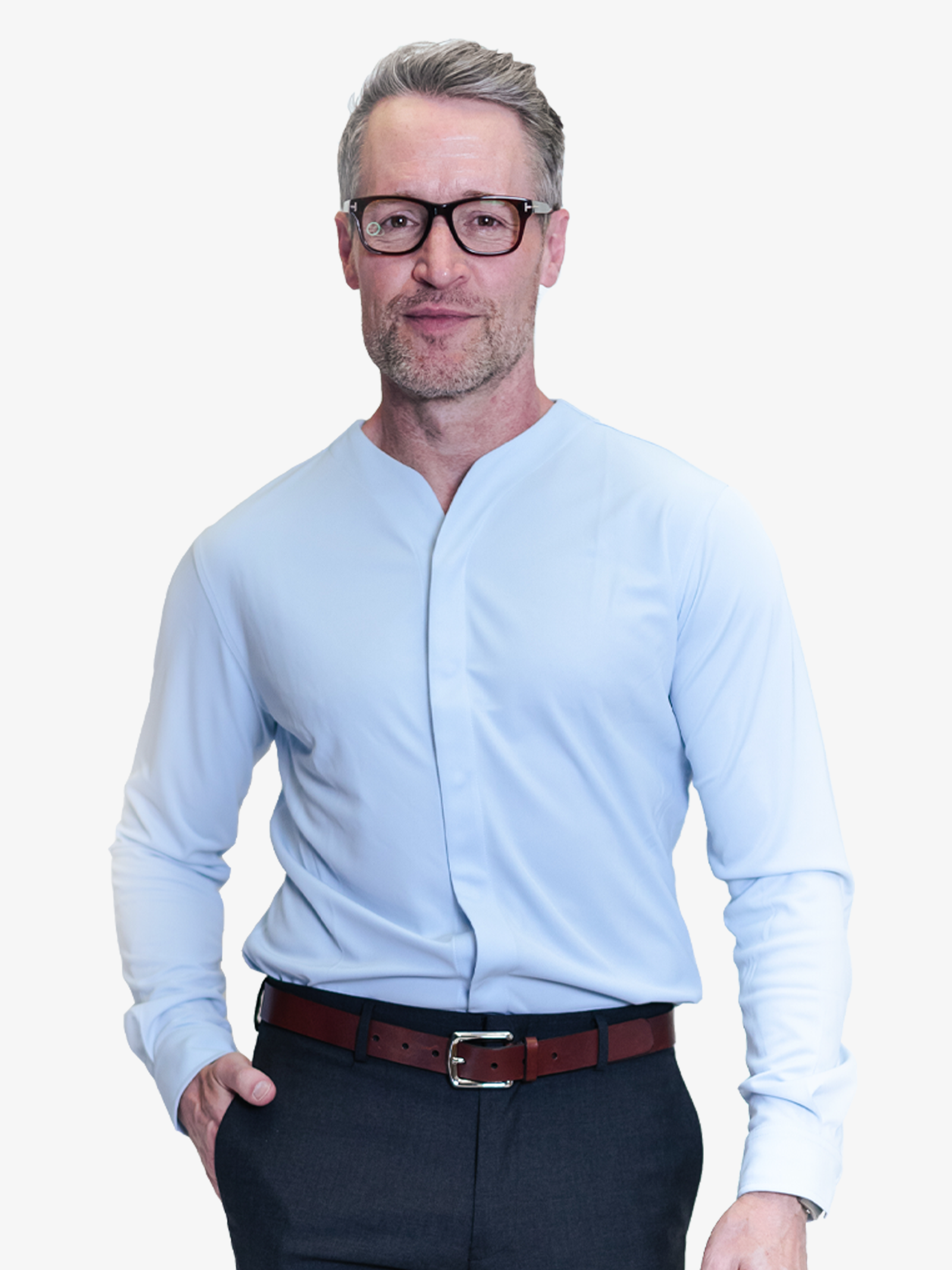 business man wearing a light blue collarless dress shirt with a nice pair of blue slacks. 