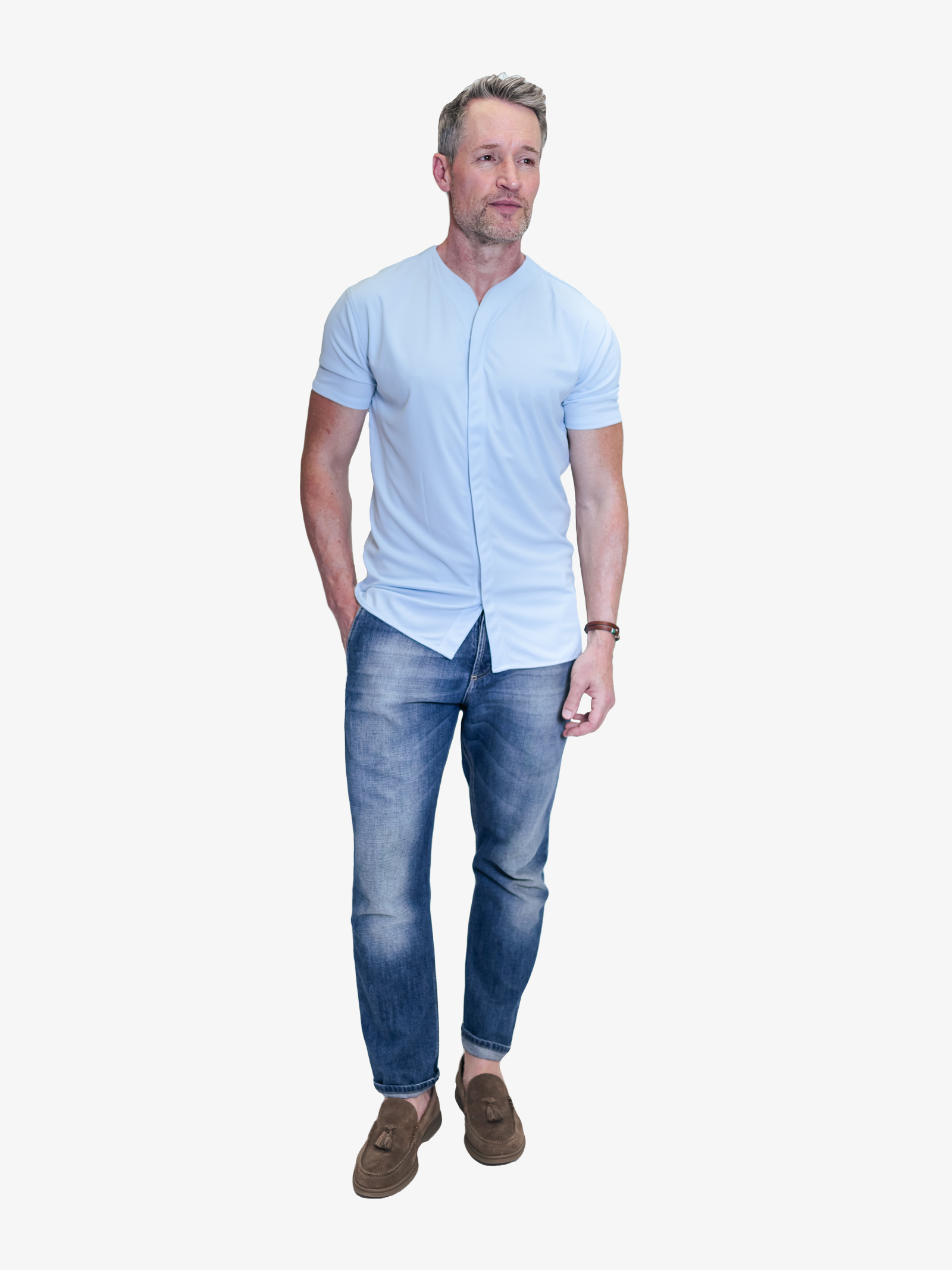 Model with fitted collarless short sleeve button down styled untucked with blue jeans