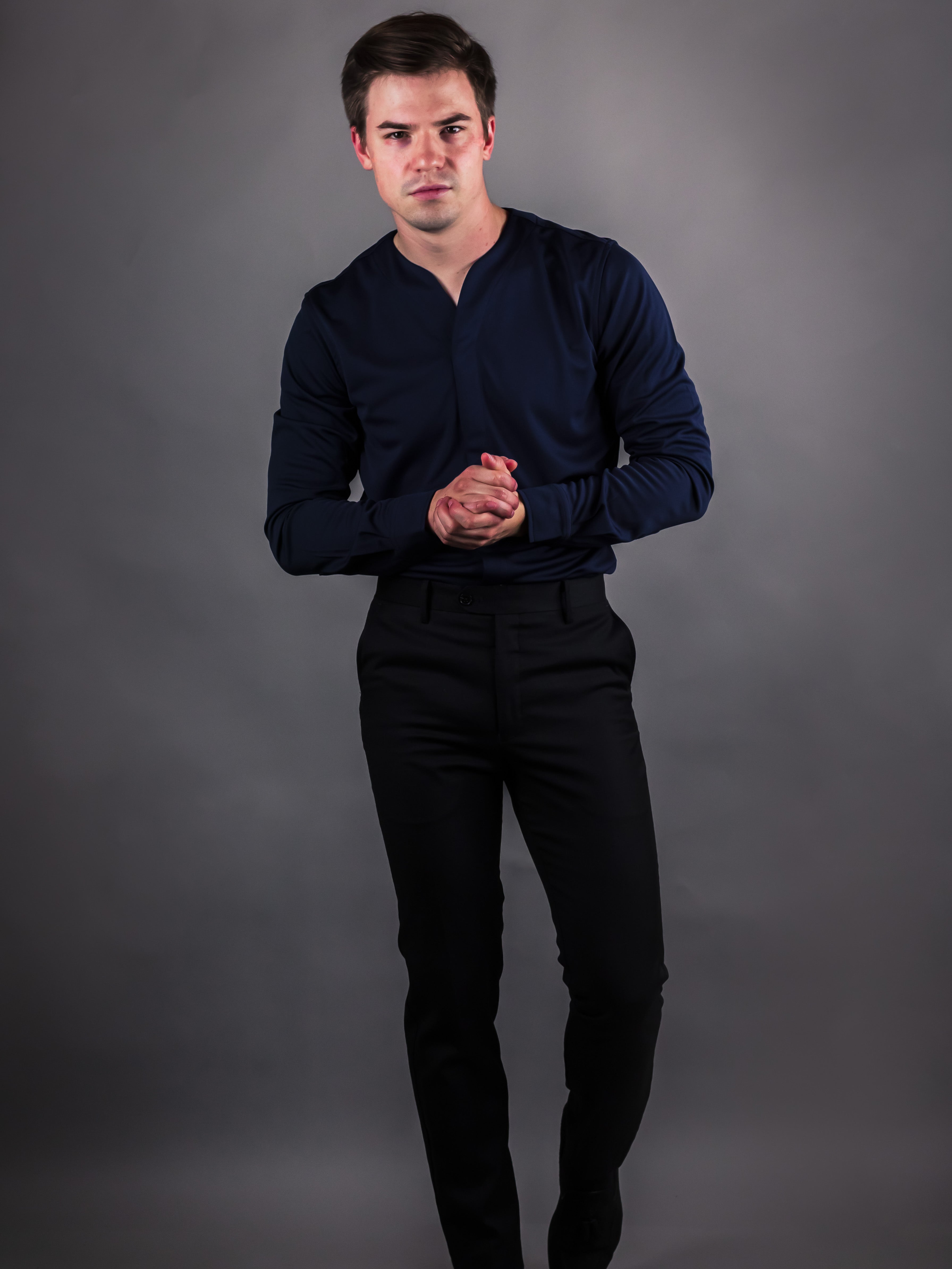 Muscular man wearing the new Long sleeve Cheegs shirt in dark blue