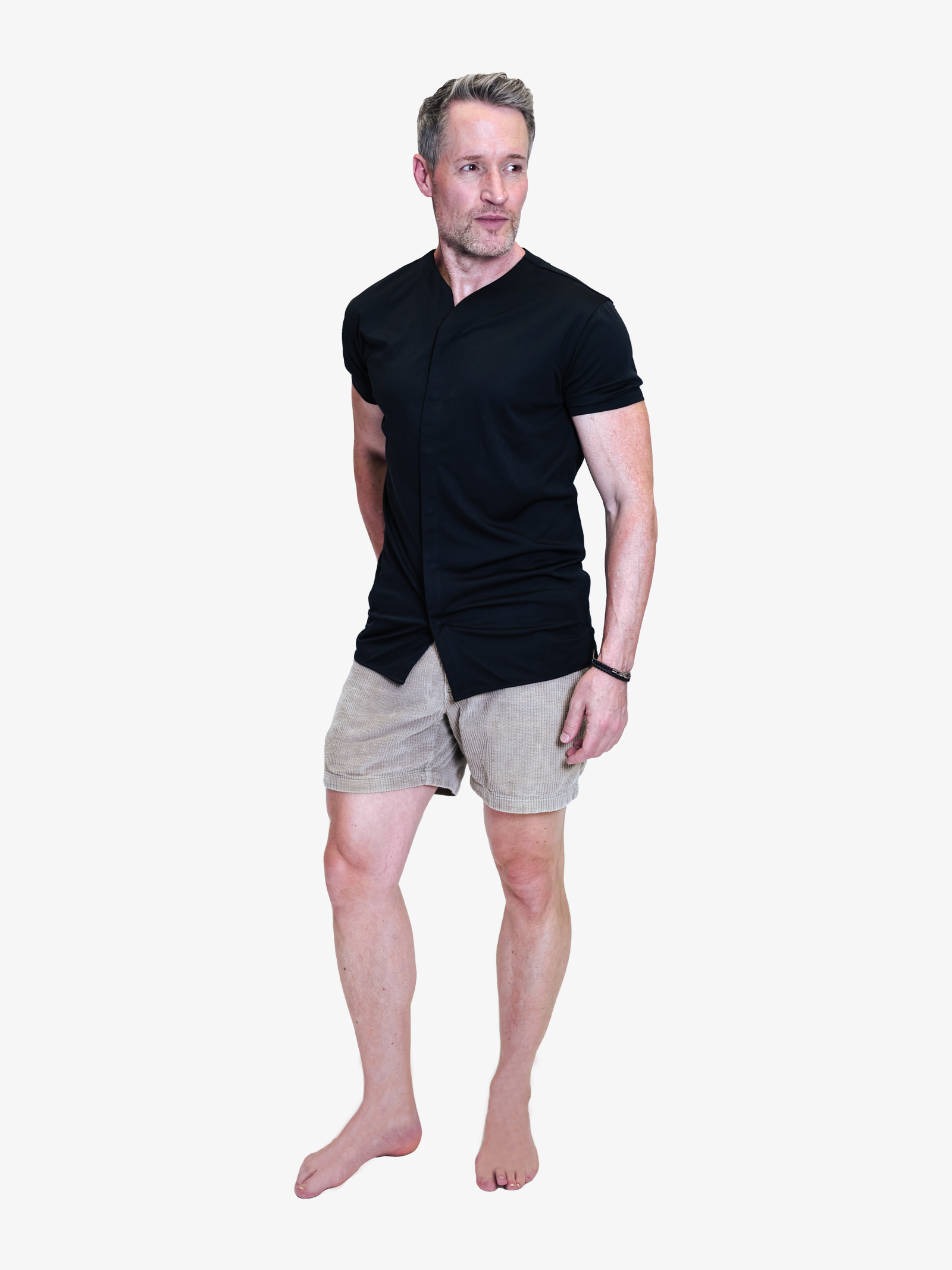 man wearing slim fit collarless short sleeve shirt in black with corduroy shorts