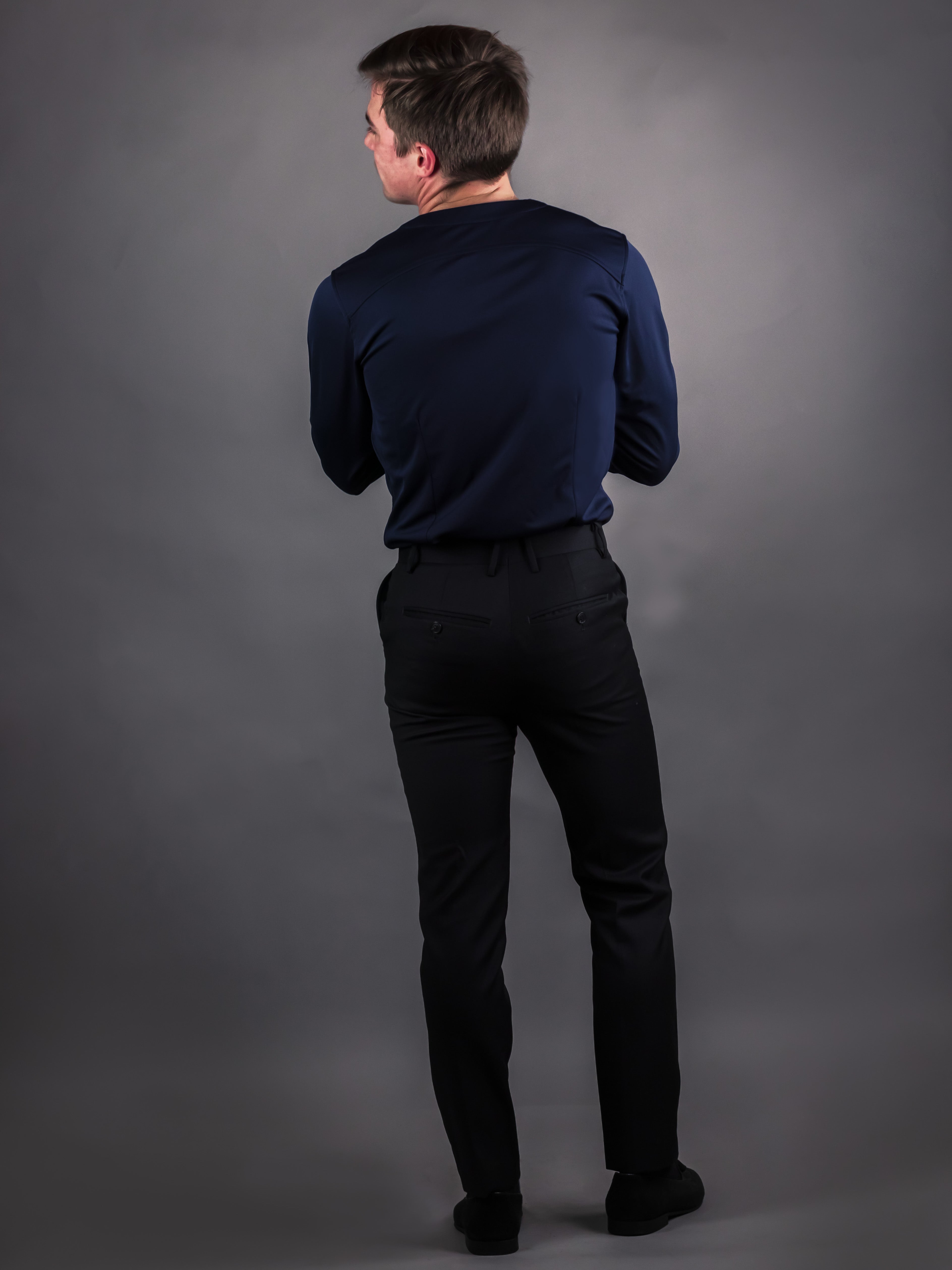 Model wearing designer mens shirt with a collarless style